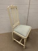 A white painted chair