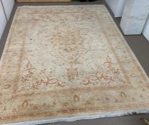 A large rug with floral border AF L320cm x W242cm