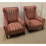 A pair of red striped upholstered library style chairs