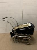 A vintage Pedigree children's pram