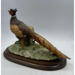 A Capodimonte Pheasant figurine by Giuseppe Armani.