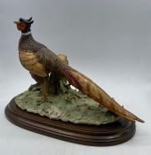 A Capodimonte Pheasant figurine by Giuseppe Armani.