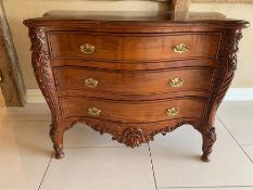 Three drawer chest of drawers with carved details (H78cm W107cm D50cm)