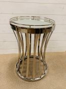 A chrome contemporary side table with mirrored tray top (H60cm Dia40cm)