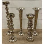 Three chrome candle holders and two trumpet vase (Tallest H60cm)