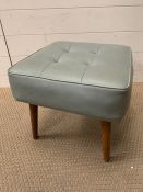 A Mid Century foot stool with buttoned seat in petrol blue (H36cm Sq40cm)