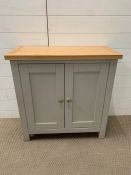 A small two door cabinet (H76cm W75cm D34cm)