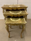 A nest of three tables, gilt painted (H58 cm x D36 cm x W57 cm)