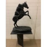 A horse sculpture on marble plinth AF (Tail broken off) (W77cm D39cm H104cm)