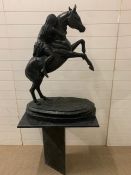 A horse sculpture on marble plinth AF (Tail broken off) (W77cm D39cm H104cm)