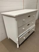 A three drawer painted pine chest of drawers (H86cm W104cm D54cm)
