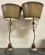 A pair of metal table lamps