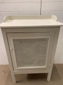 A cabinet on legs with mesh front (H120cm W78cm D45cm)