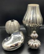 A selection of Jonathan Adler vases along with decorative objects