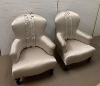 A pair of Victorian style armchairs