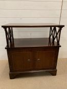 A two tier cabinet with string inlay and cross banded ends (H78cm W71cm D41cm)