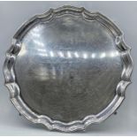 A Hallmarked silver tray, engraved on four feet, total weight 770g, Sheffield 1967
