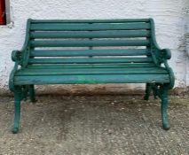 An architectural cast iron garden seat/bench, unknown if signed as bench has been painted. Local