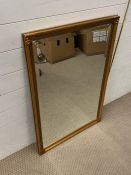 A gilt framed mirror (90cm x 63cm)