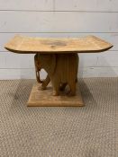 A small side table with carved elephant (H36cm W46cm D29cm)