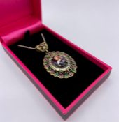 A Silver and Semi Precious pendant necklace with Queen Victoria panel