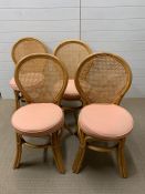 Four caned and bamboo chairs