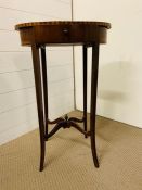 An Oval inlaid lamp or plate table on long tapering legs (W 46cm x D 29cm x H 71cm)