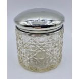 A Silver lidded cut glass container, Birmingham 1920, makers mark TW