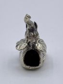 A Silver seated Elephant pincushion