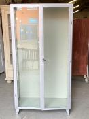 An industrial glass cabinet with glass shelves (H178cm W94cm D45cm)