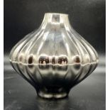 A small Jonathan Adler vase