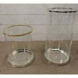 Two Ralph Lauren glass hurricane lamps