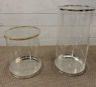 Two Ralph Lauren glass hurricane lamps