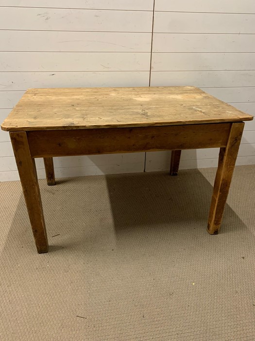 A reclaimed pine kitchen table (H76cm W123cm D80cm)