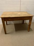 A reclaimed pine kitchen table (H76cm W123cm D80cm)