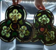 Two antique stained glass panel, depicting passion flowers, made by Heaton Butler and Blayne and