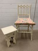 A painted side chair with spindle back and carved turn legs and small table