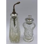 Two silver topped cut glass perfume bottles