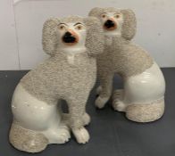 A pair of Staffordshire style dogs