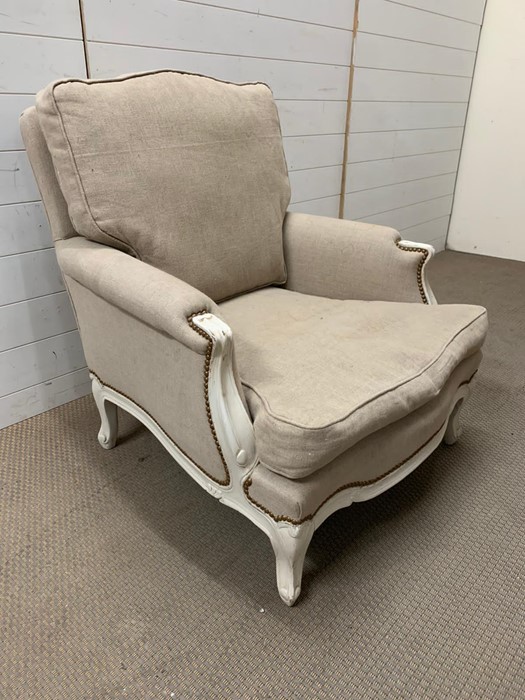 A French style armchair with stud work around arms (H88cm W80cm D75cm)