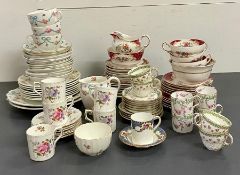 A selection of vintage tea cups and saucers, various markers