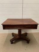 An early 19th century pedestal library table with drawers each end (H73cm W92cm D66cm)