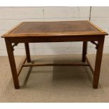 A leather top Edwardian coffee table (H48cm W68cm D49cm)