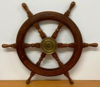 A wooden ships wheel