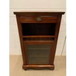 A mahogany music cabinet (H97cm W55cm D36cm)