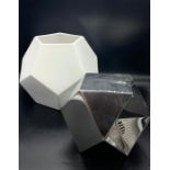 Two faceted sculptures, one is a vase by Dwell Studio Global Views (22cm x 22cm)