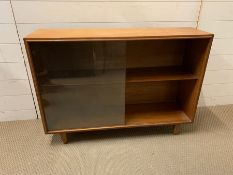 A Mid Century glazed bookcase by Beaver and Tapley (H71cm W100cm D28cm)