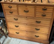 An antique pine chest of drawers five short over three long (H120cm W120cm D50cm)