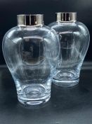 A pair of glass vases with silver effect rims (H28cm)