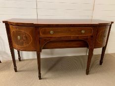 A George III satinwood strung mahogany sideboard with a cellarette drawer and a cutlery drawer (